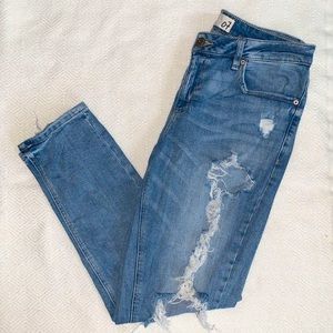 distressed light wash mom jeans